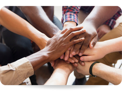This picture shows some men joining hands in group therapy.