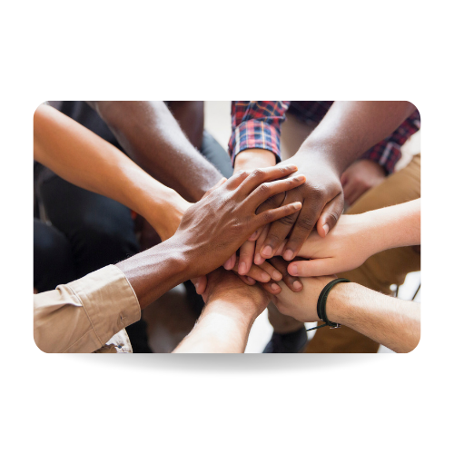 This picture shows some men joining hands in group therapy.